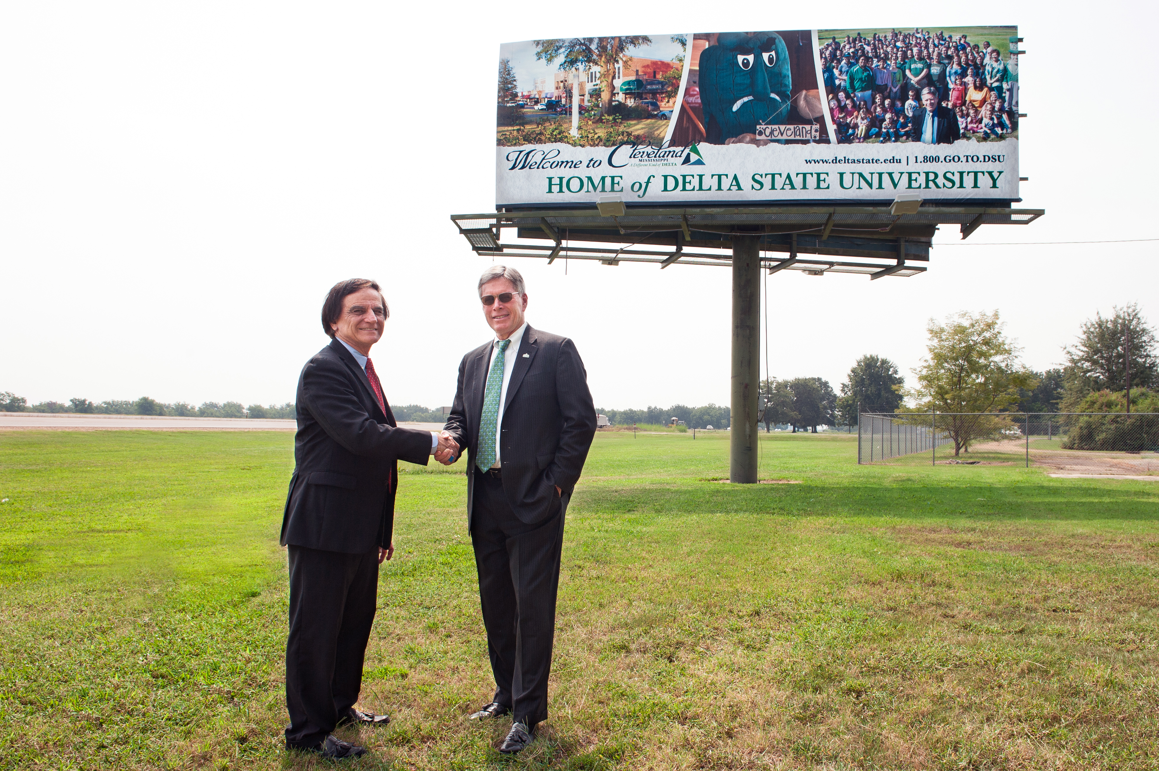 Dr. James Robinson (left) personally funded this new Delta State billboard on U.S. Highway 61 just north of Cleveland to show his support for President William N. LaForge and the university.